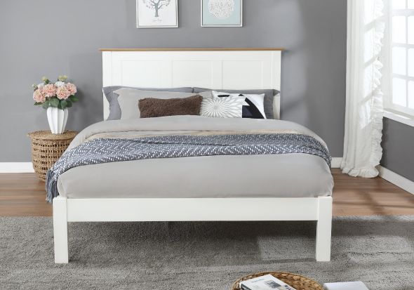 Classic style white painted wooden bed frame with a solid light oak headboard plinth. Low foot end. Panelled headboard.