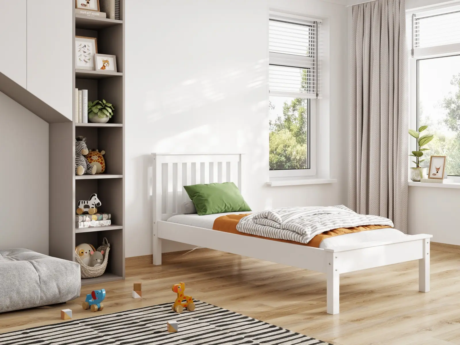 White wooden child's bed with orange and green bedding