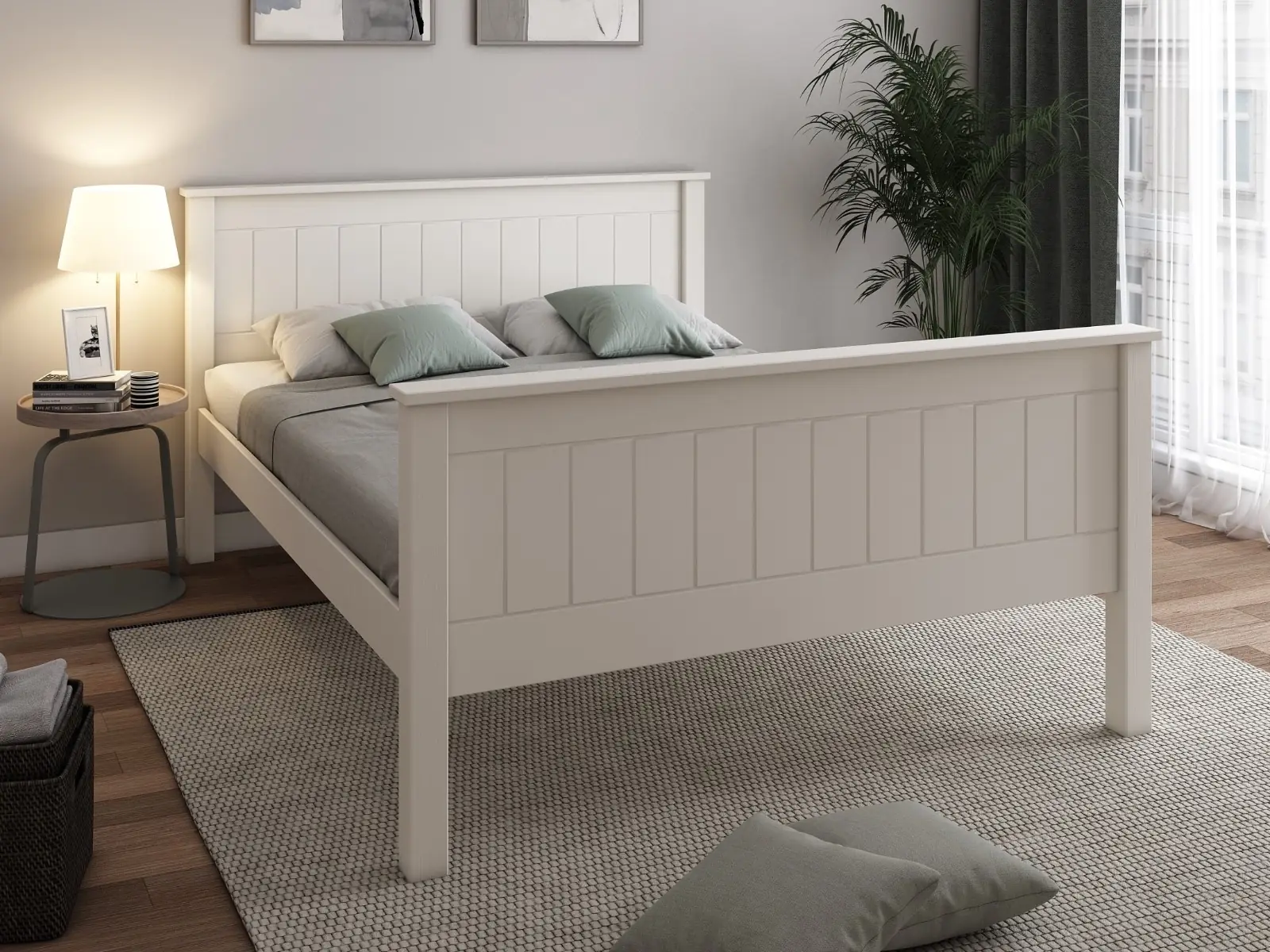 Wooden double bed with grey sheets